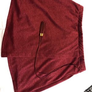Maroon tie across skirt